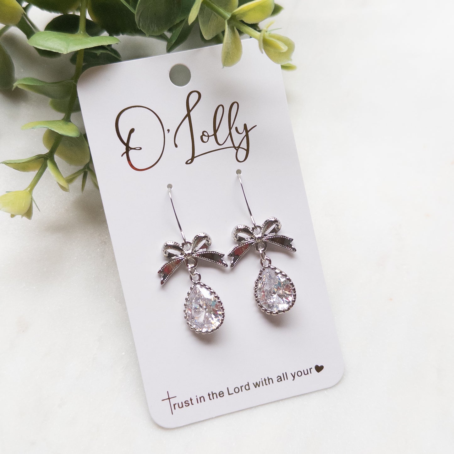 Silver Bow w/Cubic Zirconia Teardrop- “Lace”