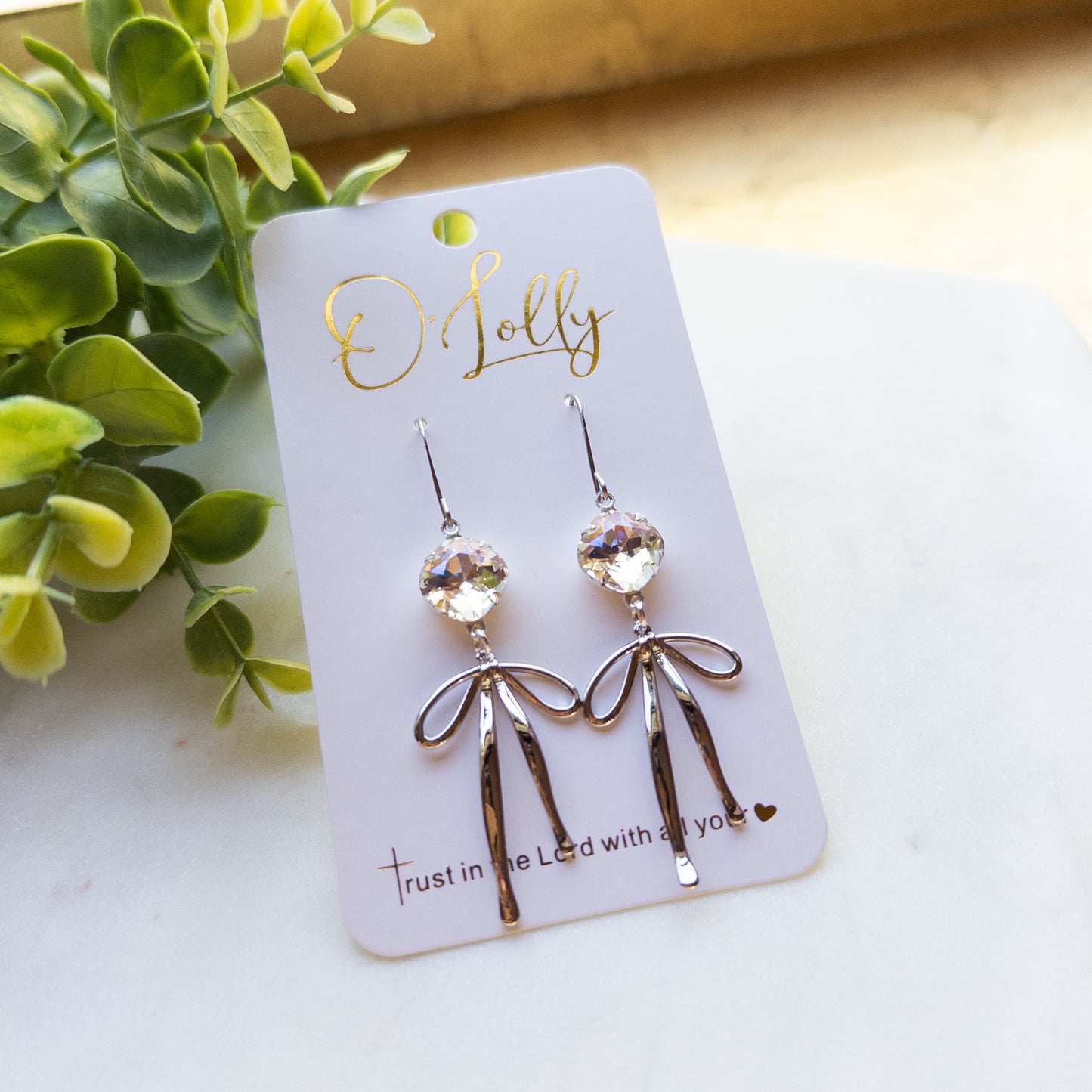 O’Lolly “Blakely” Earrings- Clear Stone w/Gold Bow Dangle