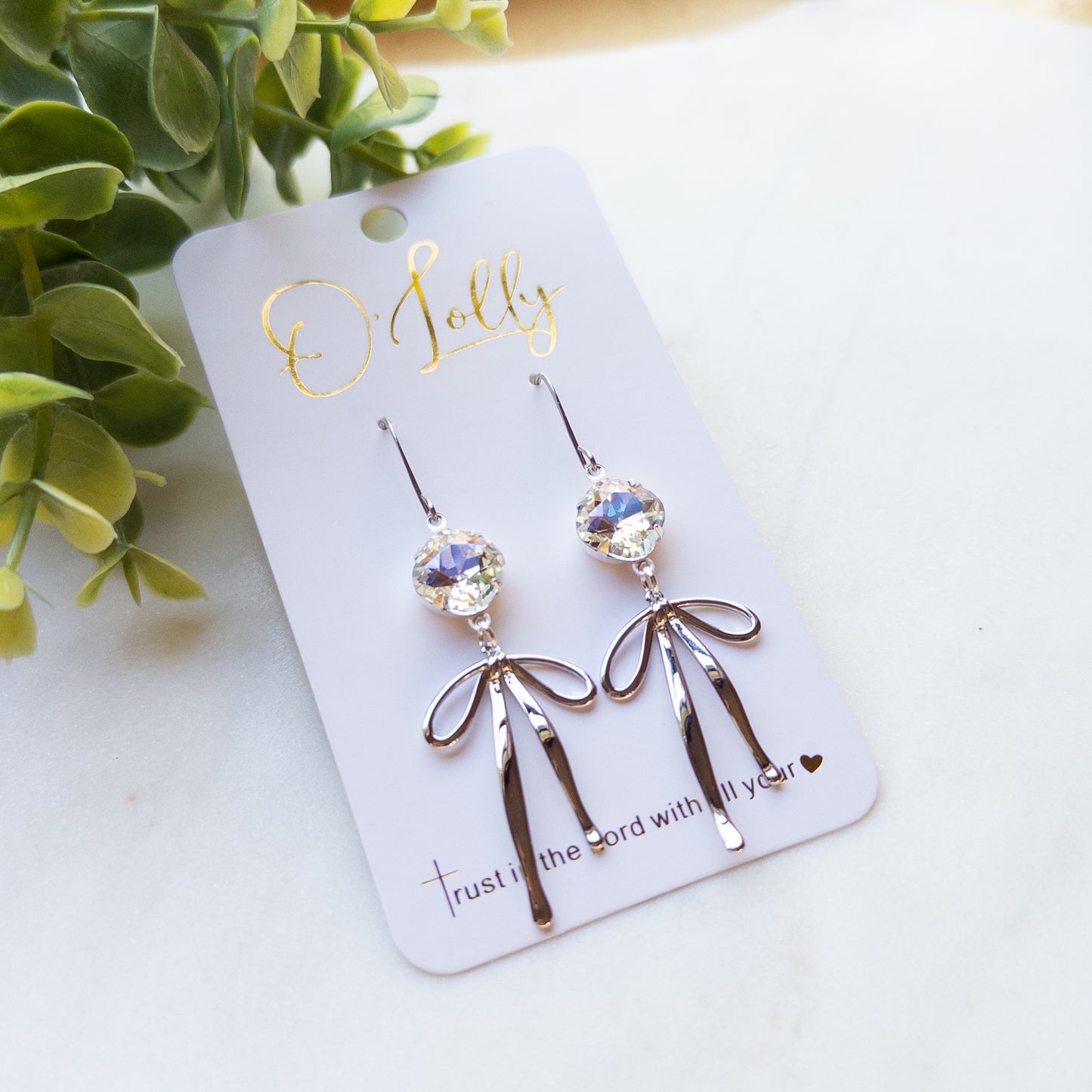 O’Lolly “Blakely” Earrings- Clear Stone w/Gold Bow Dangle