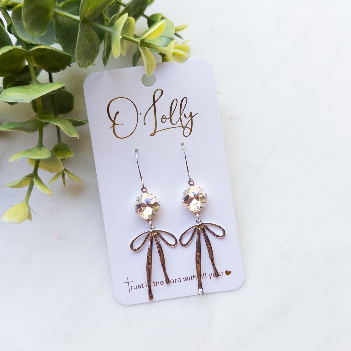 O’Lolly “Blakely” Earrings- Clear Stone w/Gold Bow Dangle