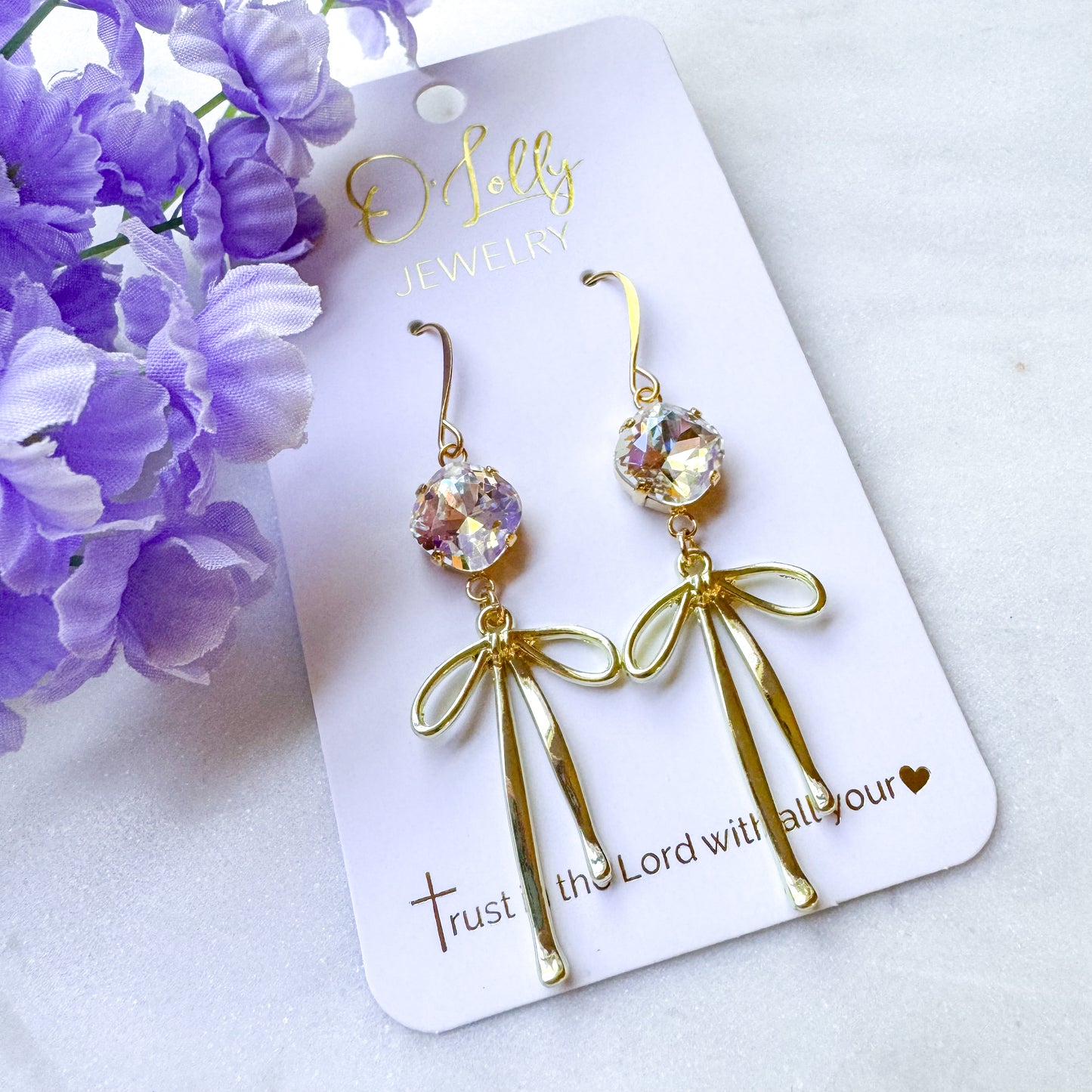 O’Lolly “Blakely” Earrings- Clear Stone w/Gold Bow Dangle