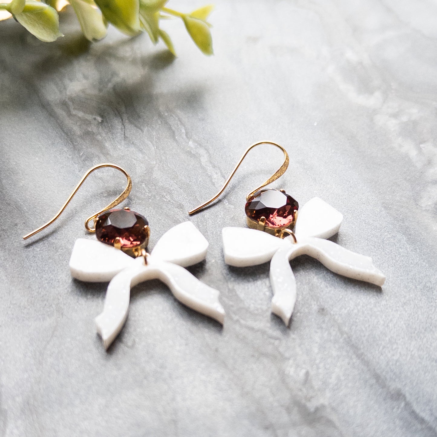 White Bow Earrings w/Maroon Stone