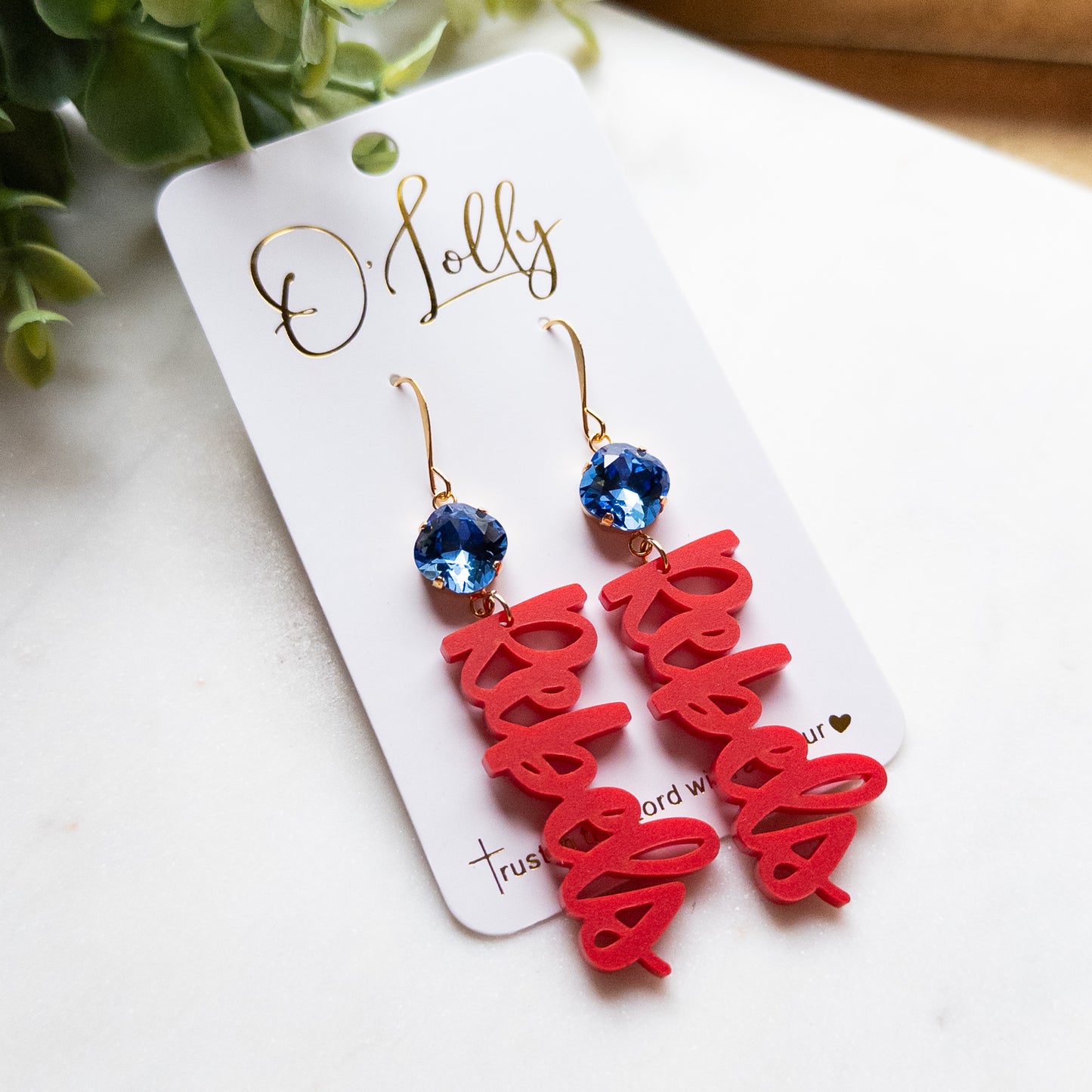 Red Acrylic Rebels Earrings w/Blue Stone