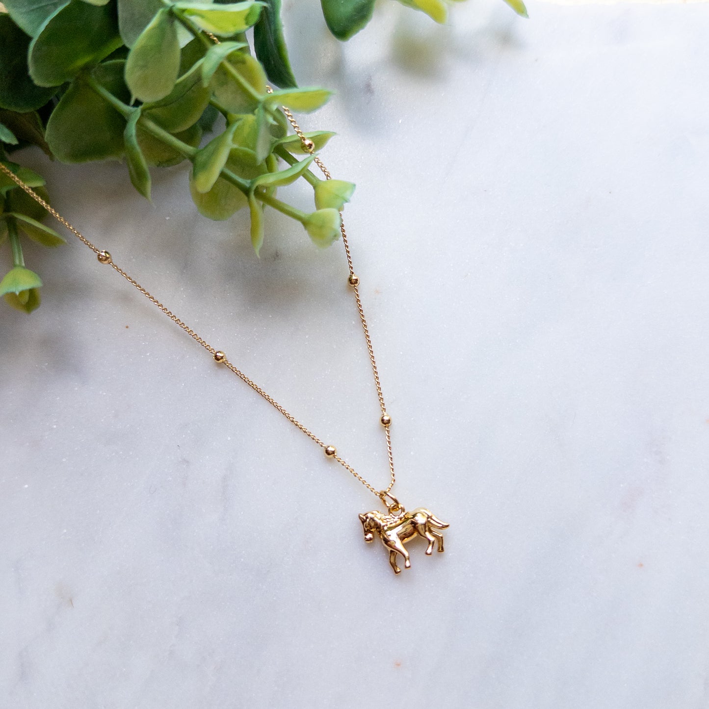 Golden Race Horse Necklace