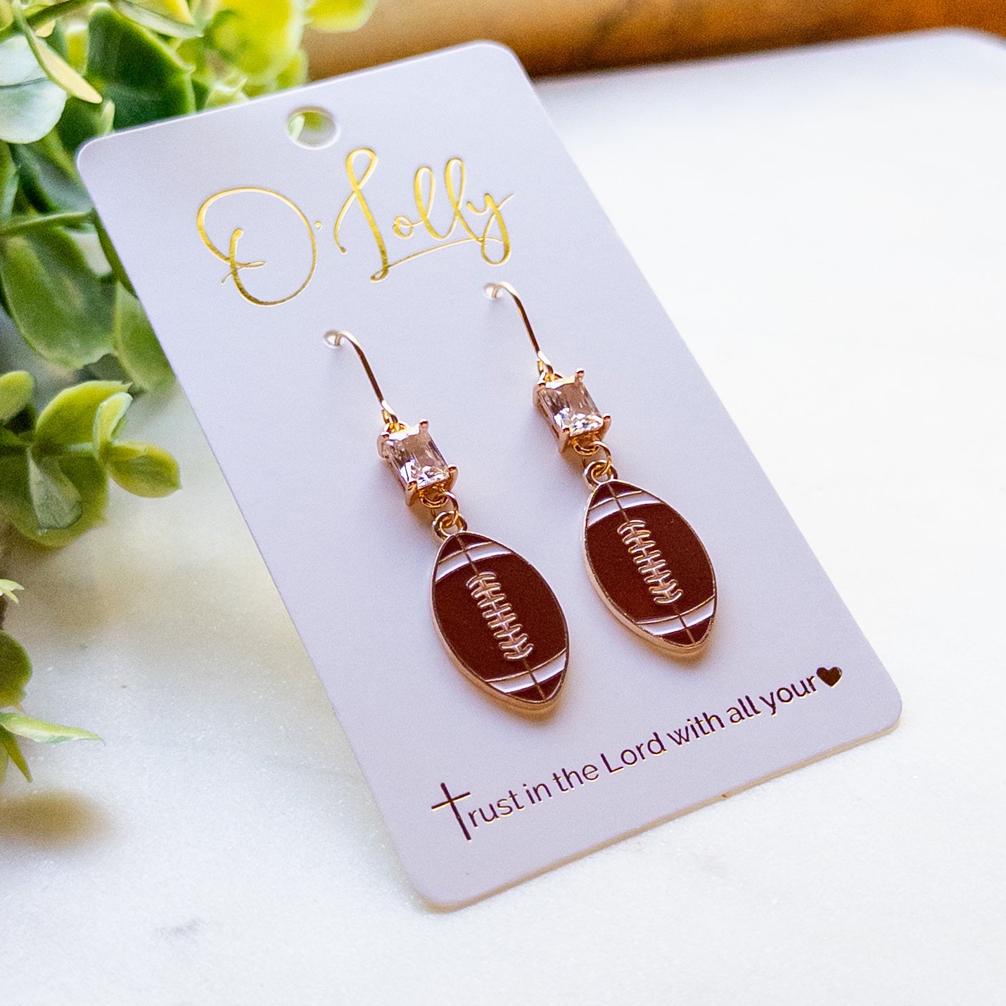 Gold Football Dangle Earrings with Cubic Zirconia Accent “Blitz”