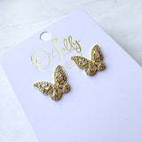 O’Lolly “Vanna” Earrings- Gold CZ Butterfly Studs