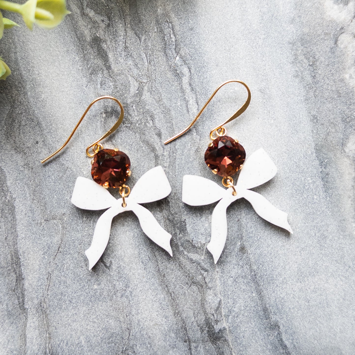 White Bow Earrings w/Maroon Stone