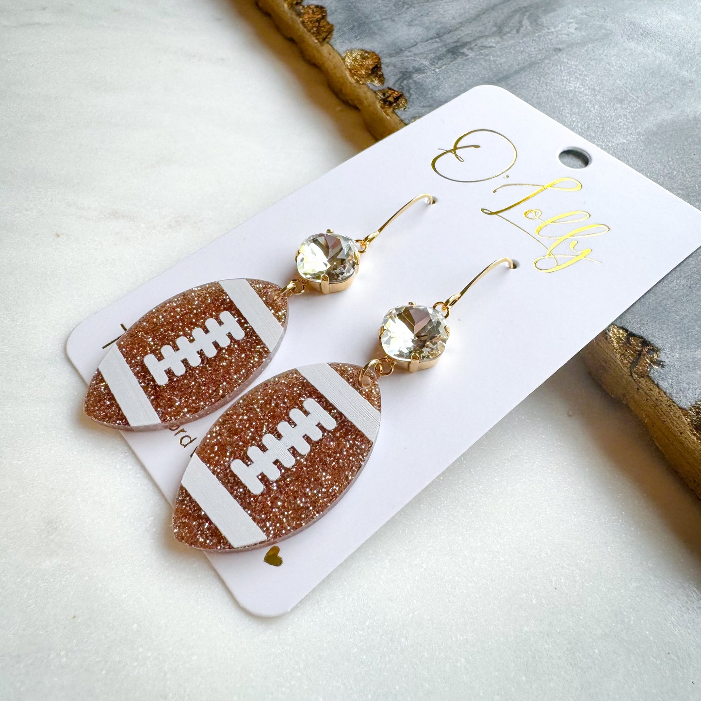 O’Lolly “Football” Earrings- Clear Stone w/Glitter Acrylic Football